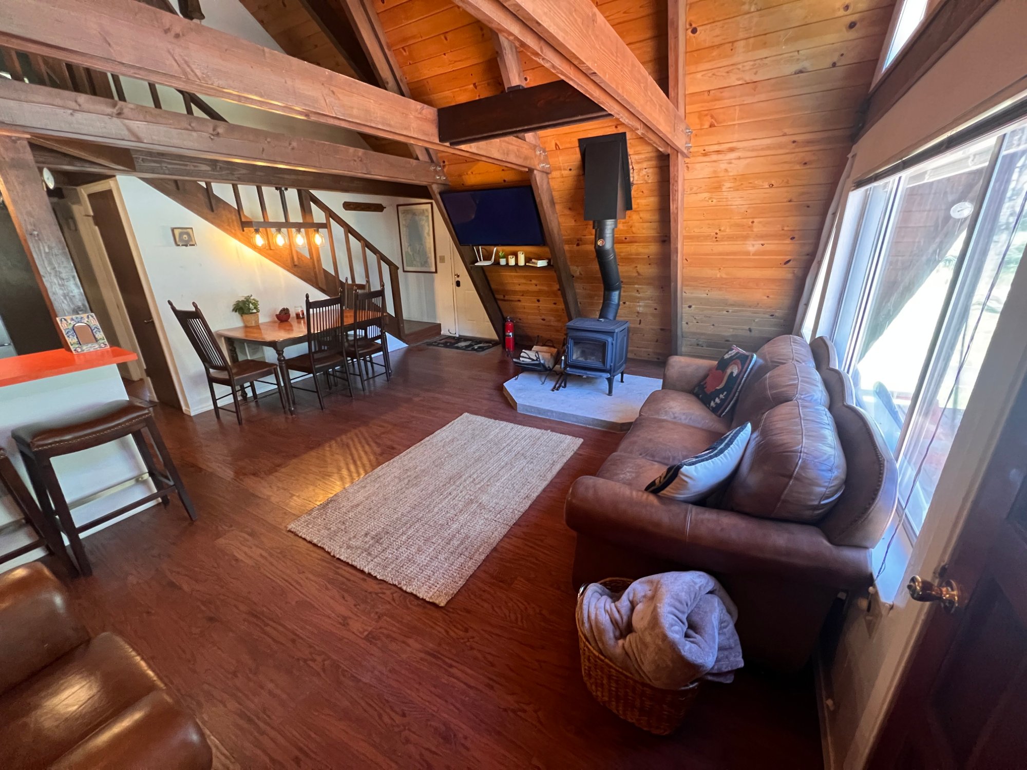 Open living area from sofa toward kitchen